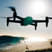 Aeroo Pro Drone flying over beach with fishing rod in background