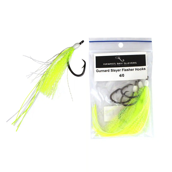 A packaged set of Hawkes Bay Slayers Gurnard Slayer Flasher Hooks 4/0 shown next to an individual hook with a neon yellow-green skirt and black hook on a white background.