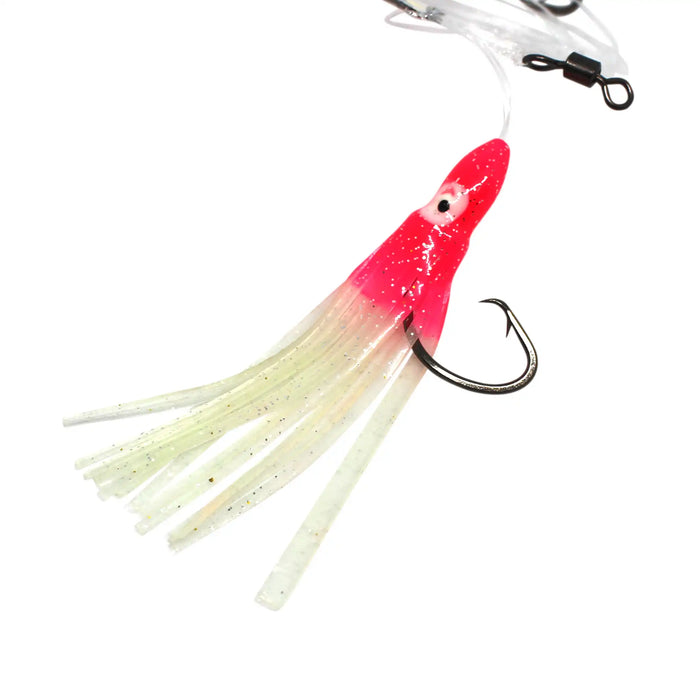 A soft plastic fishing lure with a bright pink and white body, translucent white skirt, and a black treble hook, shown on a plain white background.