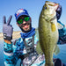 Man holding a large fish wearing hPa Tackmax Fishing Gloves
